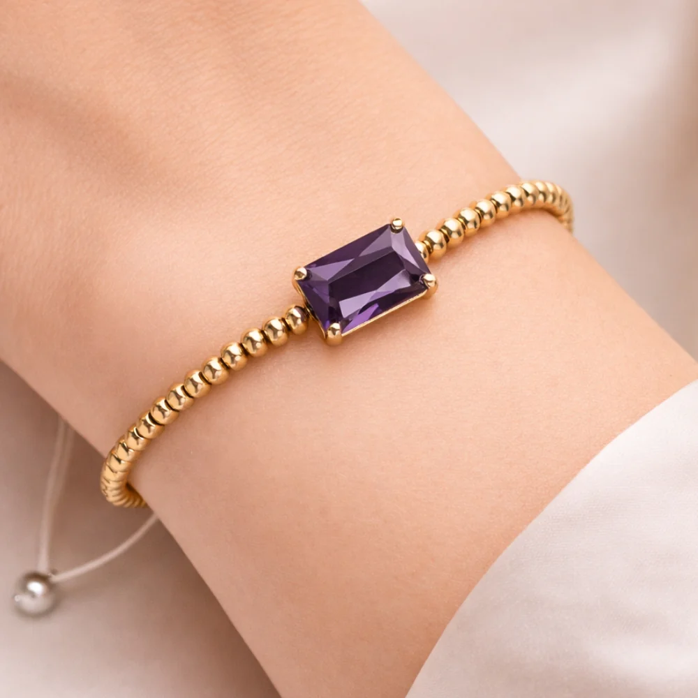 H&Co Pulsera Ajustable Para Damas de Hematita con Dije Purple